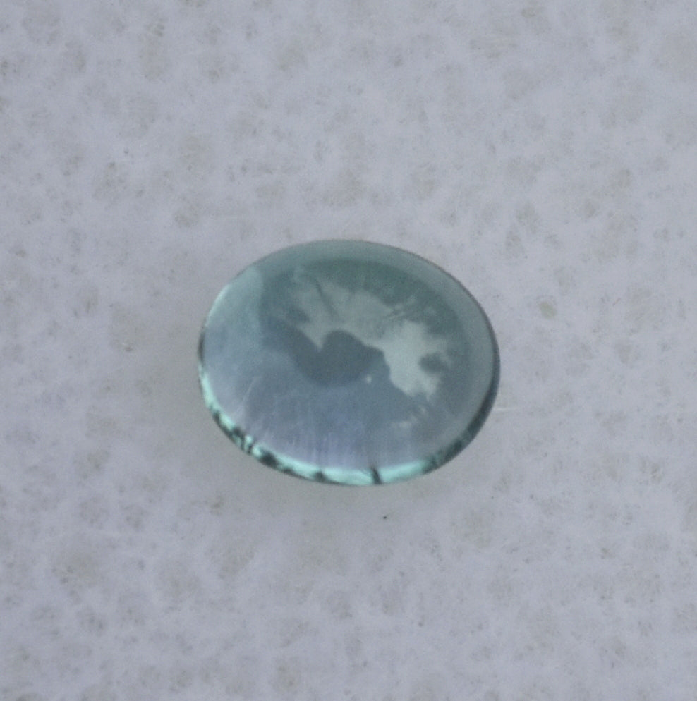 LOUPE CLEAN Chrome Kornerupine Cabochon - Good Balance of Teal and Purple - 0.33 ct.