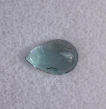 Load image into Gallery viewer, LG Chrome Kornerupine Cabochon Gem - Very Clean Specimen - 1.52 ct.
