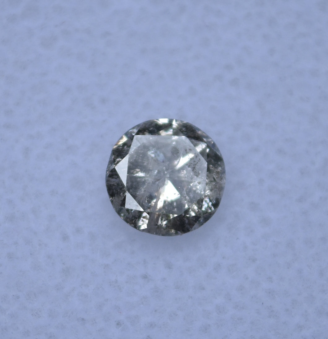 Salt and Pepper Diamond - 0.69 ct.;  5.8 mm round