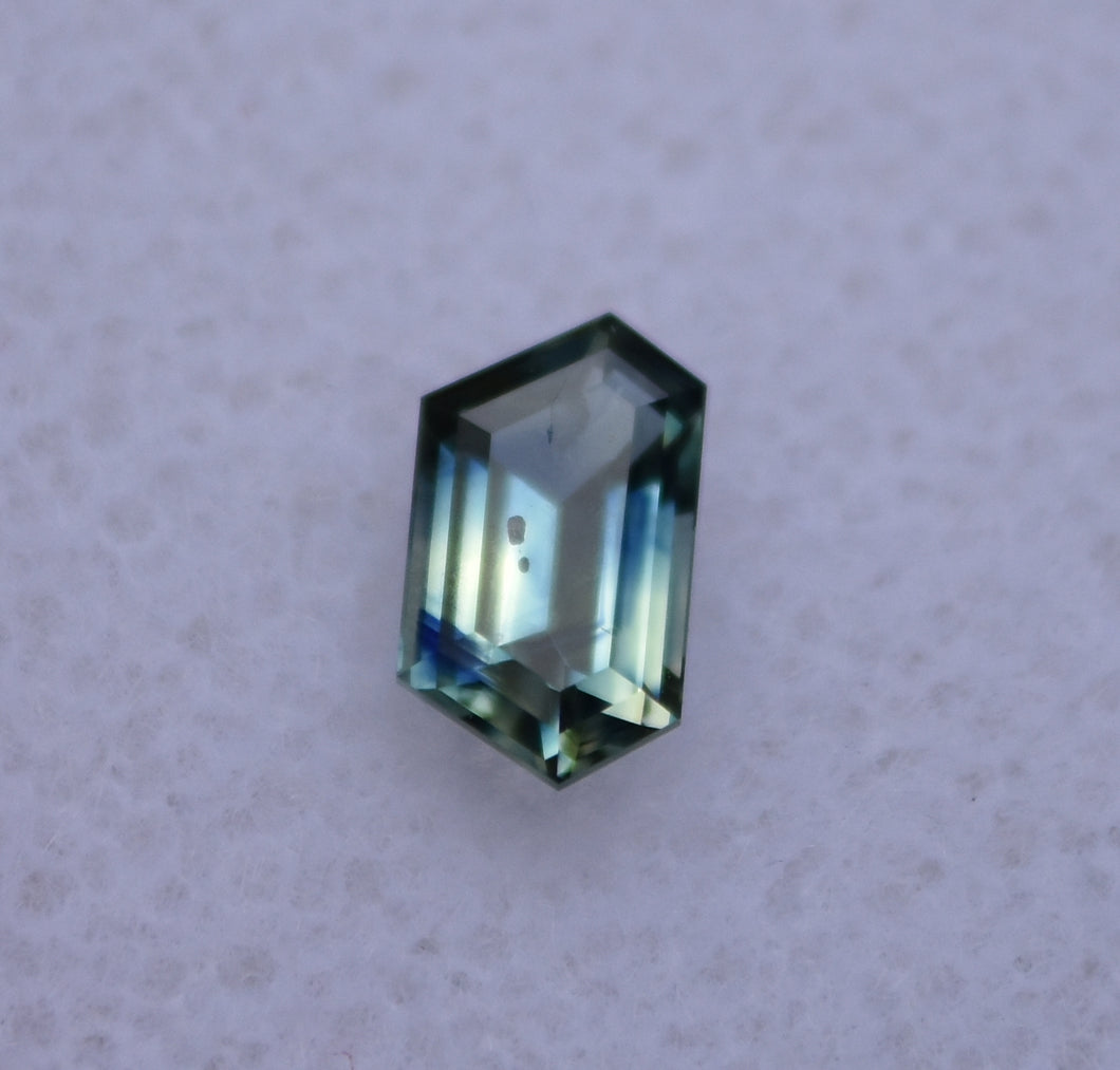 Heated Australian Sapphire - 0.76 ct. - Buttery Light Yellow, with Royal Blue Hexagonal Color Phantom
