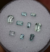 Load image into Gallery viewer, Chrome and Vanadium Kornerupine Emerald-Cut Melee Set (9 pcs.) - 1.64 ctw.
