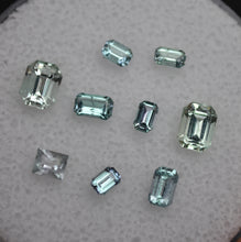 Load image into Gallery viewer, Chrome and Vanadium Kornerupine Emerald-Cut Melee Set (9 pcs.) - 1.64 ctw.
