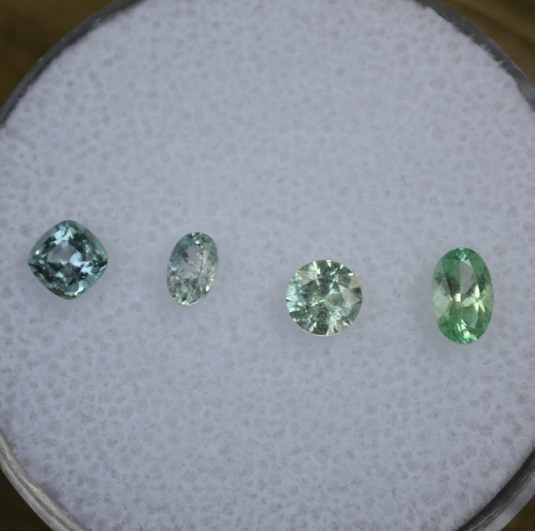 Mixed Chrome and Vanadium Kornerupine Melee Gems - 0.95 ctw.