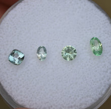 Load image into Gallery viewer, Mixed Chrome and Vanadium Kornerupine Melee Gems - 0.95 ctw.
