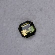 Load image into Gallery viewer, Dichroic Yellow and Green Kornerupine from Madagascar - 0.62 ct.
