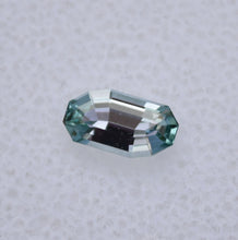Load image into Gallery viewer, 0.66 ct. Eye Clean Chrome Kornerupine - Custom Wavy Step-Cut Gem
