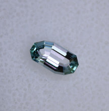 Load image into Gallery viewer, 0.66 ct. Eye Clean Chrome Kornerupine - Custom Wavy Step-Cut Gem
