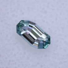 Load image into Gallery viewer, 0.66 ct. Eye Clean Chrome Kornerupine - Custom Wavy Step-Cut Gem
