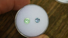 Load and play video in Gallery viewer, Fantastic Pairing of Chrome and Vanadium Kornerupine Round Gems - 1.4 ctw.  BOTH faceted by Scott Maier in Vermont
