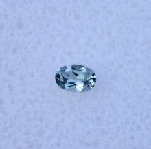 Load image into Gallery viewer, Small Oval Chrome Kornerupine Gem - Good Trichroism for the Size - 0.105 ct.
