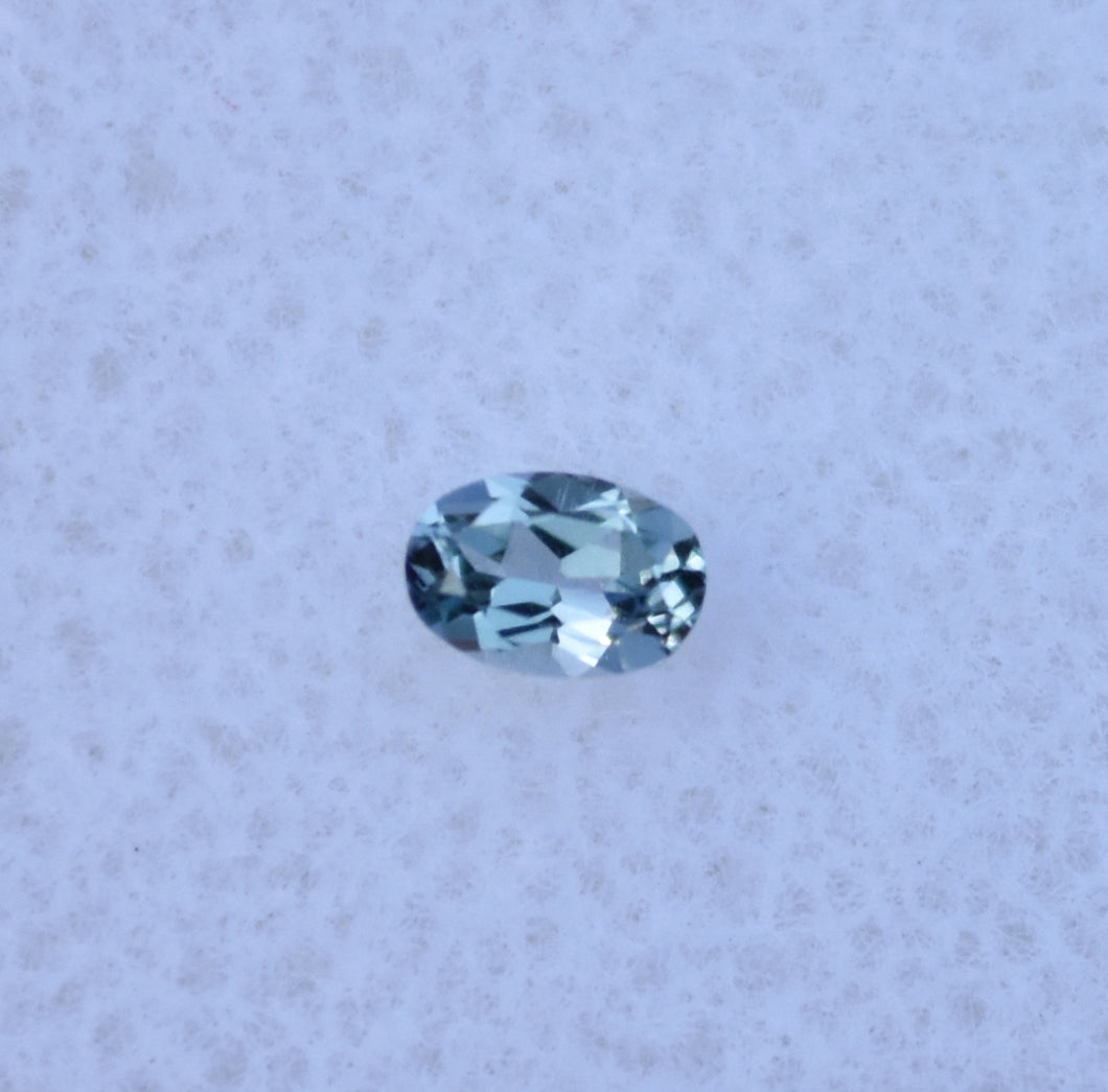 Small Oval Chrome Kornerupine Gem - Good Trichroism for the Size - 0.105 ct.