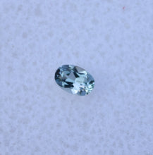 Load image into Gallery viewer, Small Oval Chrome Kornerupine Gem - Good Trichroism for the Size - 0.105 ct.
