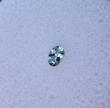 Load image into Gallery viewer, Small Oval Chrome Kornerupine Gem - Good Trichroism for the Size - 0.105 ct.
