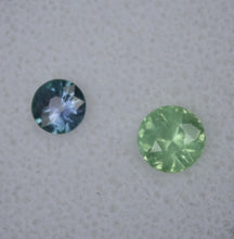 Load image into Gallery viewer, Fantastic Pairing of Chrome and Vanadium Kornerupine Round Gems - 1.4 ctw.  BOTH faceted by Scott Maier in Vermont
