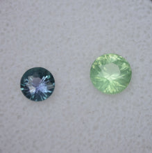 Load image into Gallery viewer, Fantastic Pairing of Chrome and Vanadium Kornerupine Round Gems - 1.4 ctw.  BOTH faceted by Scott Maier in Vermont
