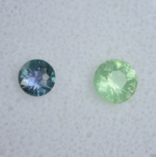 Load image into Gallery viewer, Fantastic Pairing of Chrome and Vanadium Kornerupine Round Gems - 1.4 ctw.  BOTH faceted by Scott Maier in Vermont
