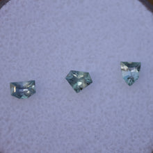 Load image into Gallery viewer, Set of 3 Chrome Kornerupine Gems - Unique Shapes - Trichroic - 0.46 ctw.
