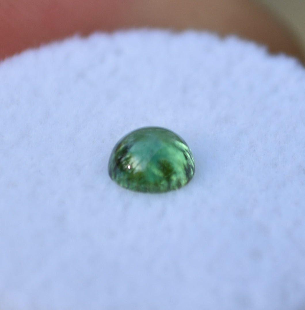 Unusually Deep Green Kornerupine Cabochon - Perfect High Dome Shape - Great Clarity - 0.52 ct.