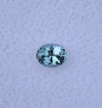 Load image into Gallery viewer, EYE CLEAN Chrome Kornerupine Gemstone - Classic Oval - Dichroic - 0.28 ct.
