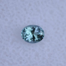 Load image into Gallery viewer, EYE CLEAN Chrome Kornerupine Gemstone - Classic Oval - Dichroic - 0.28 ct.
