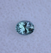 Load image into Gallery viewer, EYE CLEAN Chrome Kornerupine Gemstone - Classic Oval - Dichroic - 0.28 ct.
