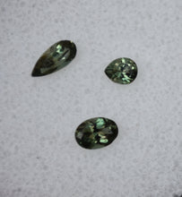 Load image into Gallery viewer, Madagascar Kornerupine Parcel - Dichroic Green Gems - SUPER Clean - 0.78 ctw.
