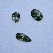 Load image into Gallery viewer, Madagascar Kornerupine Parcel - Dichroic Green Gems - SUPER Clean - 0.78 ctw.
