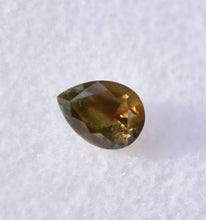 Load image into Gallery viewer, Kenya &#39;Oddball&#39; Yellow sapphire - With a plane of golden schiller - 0.86 ct.
