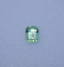 Load image into Gallery viewer, Vibrant Neon Green Vanadium Kornerupine - Emerald Cut - 0.49 ct.
