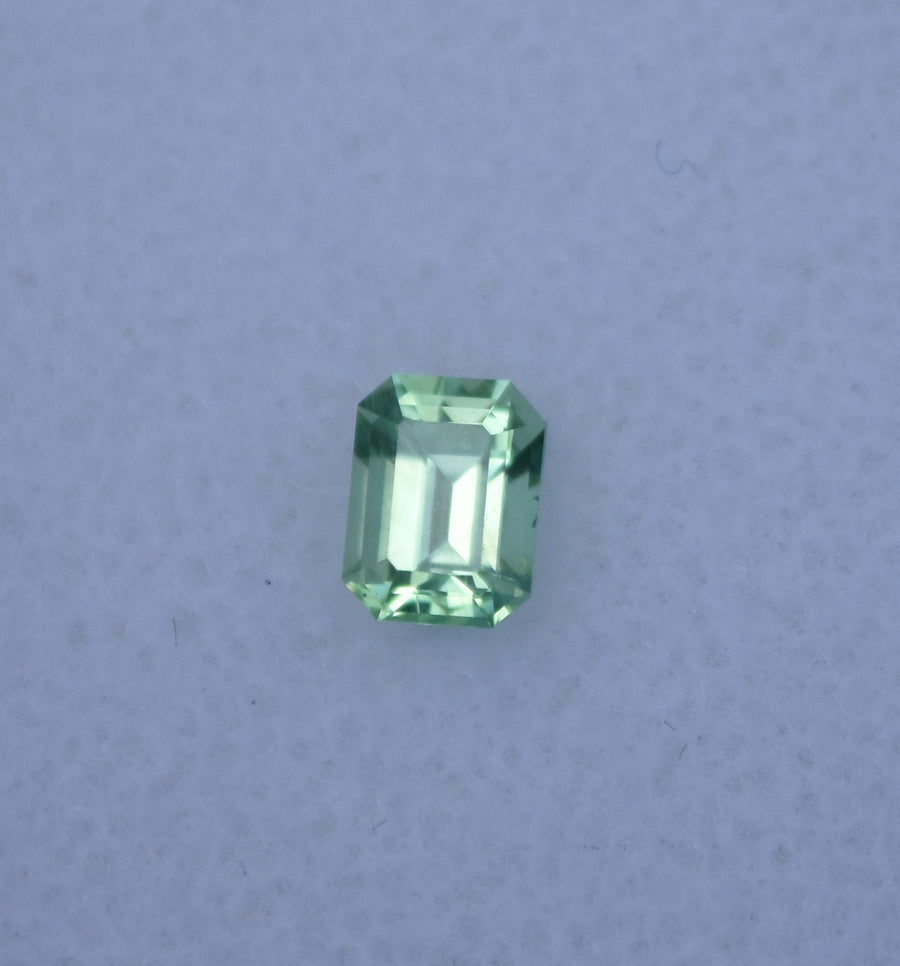 Vibrant Neon Green Vanadium Kornerupine - Emerald Cut - 0.49 ct.